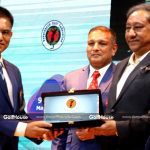 Chief guest and BCB president Nazmul Hassan papon (C) unveils the AB Bank Bangladesh Open trophy during a ceremony at the kurmitola Golf Club recently.