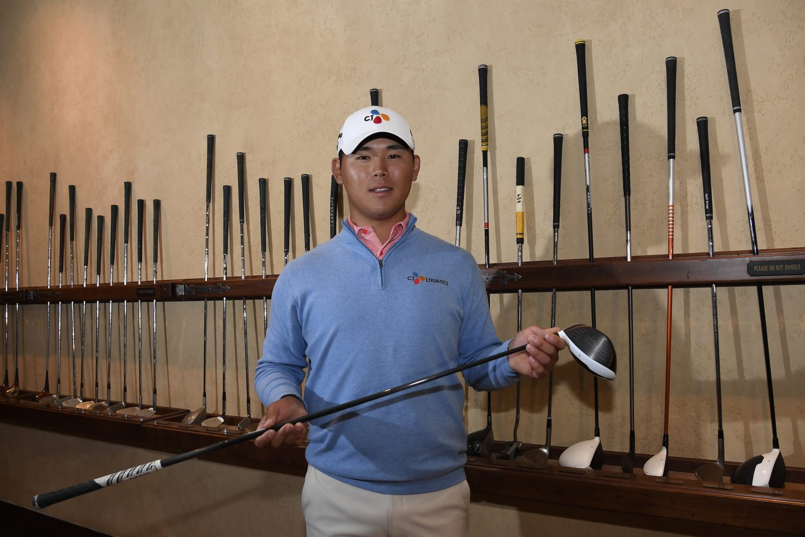 PONTE_VEDRA_BEACH_FL _MARCH_12: 2017_Defending_Champion_Si_Woo_Kim_of_South_Korea_donates_his_driver_to_the_clubhouse_collection_during_THE_PLAYERS_Media_Day_TPC_Sawgrass_on_March_12_2018_in_Ponte_Vedra_Beach_Florida_(Photo_by_Chris_Condon/PGA_TOUR)
