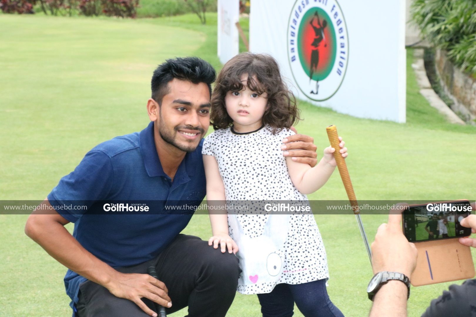 This_is_not_a_scene_from_shooting_of_a_cinema_or_drama_The_Asian_Tour_brought_two_stars_from_two_different_worlds_to_the_Kurmitola_Golf_Club_And_they_became_devoted_students_of_star_golfer_Siddikur_Rahman.