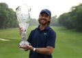 NEW DELHI, INDIA - OCTOBER 19: Tommy Fleetwood of England poses with the trophy following victory on day four of the DP World India Championship 2025 at Delhi Golf Club on October 19, 2025 in New Delhi, India. (Photo by Prakash Singh/Getty Images)